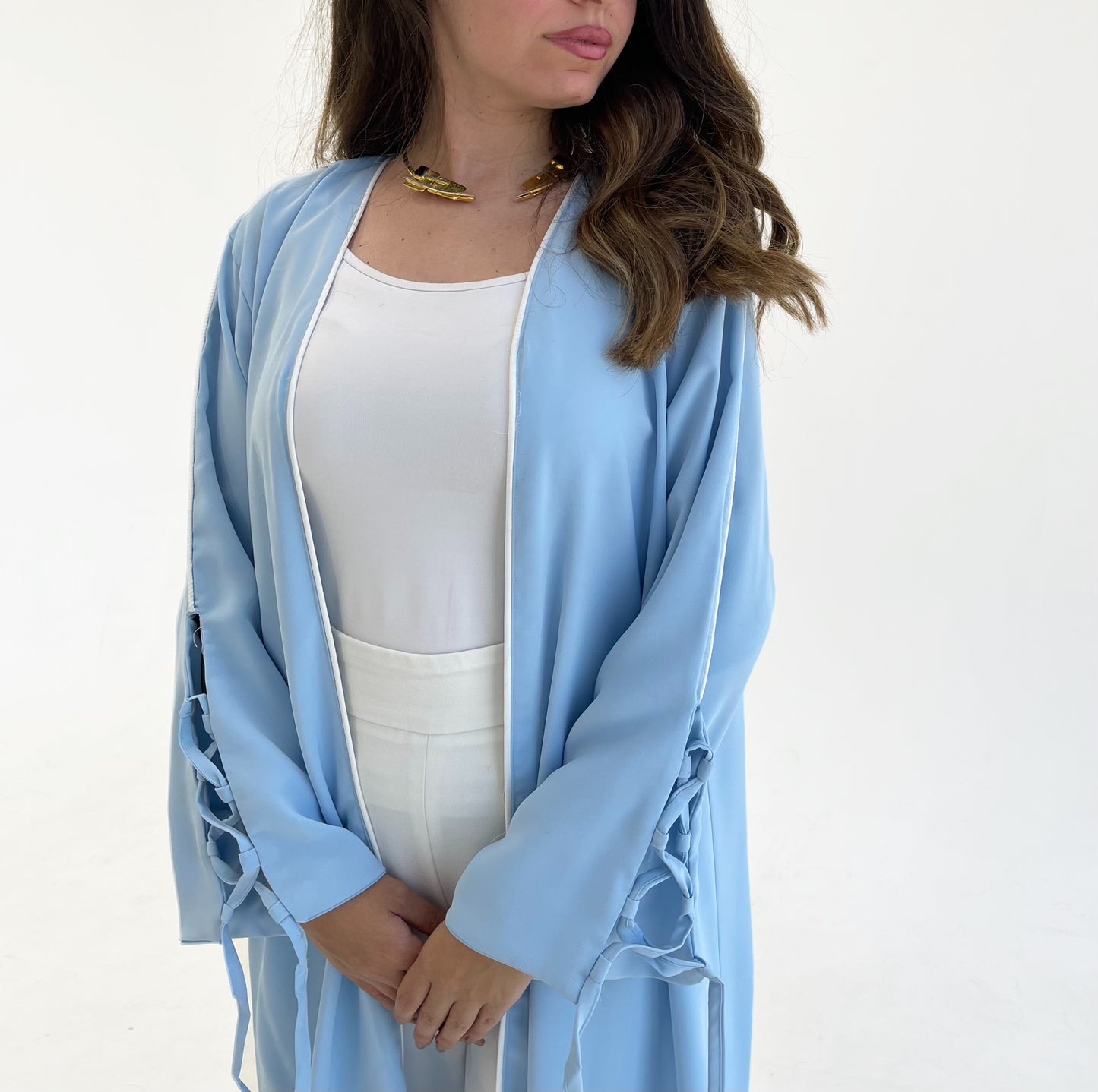 Dolly Baby blue Abaya with White details.