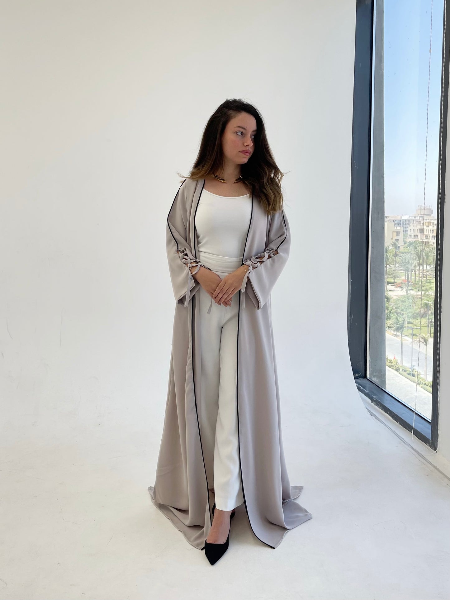 Dolly Grey Abaya with Black details.